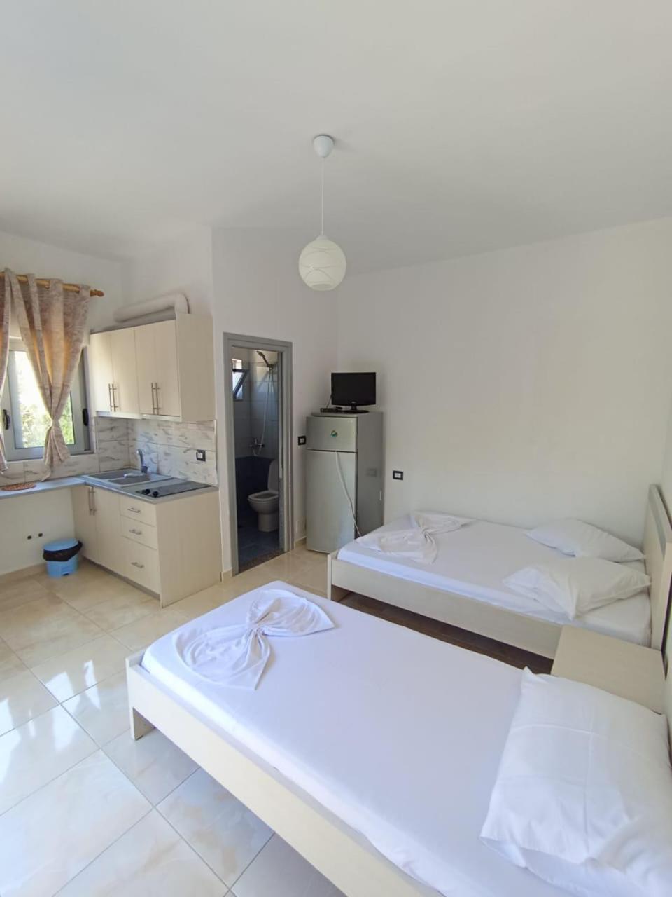 Alinani Apartments Ksamil Rum bild